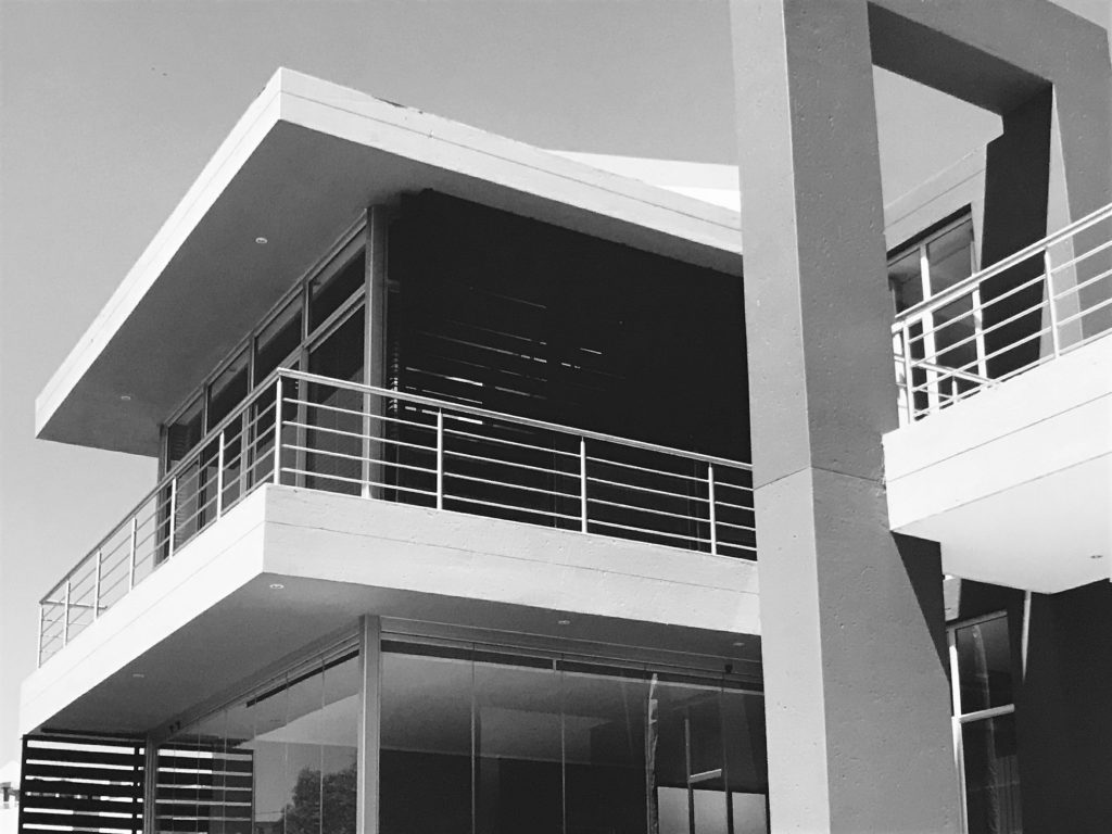 black and white pictire of a balcony in a modern house